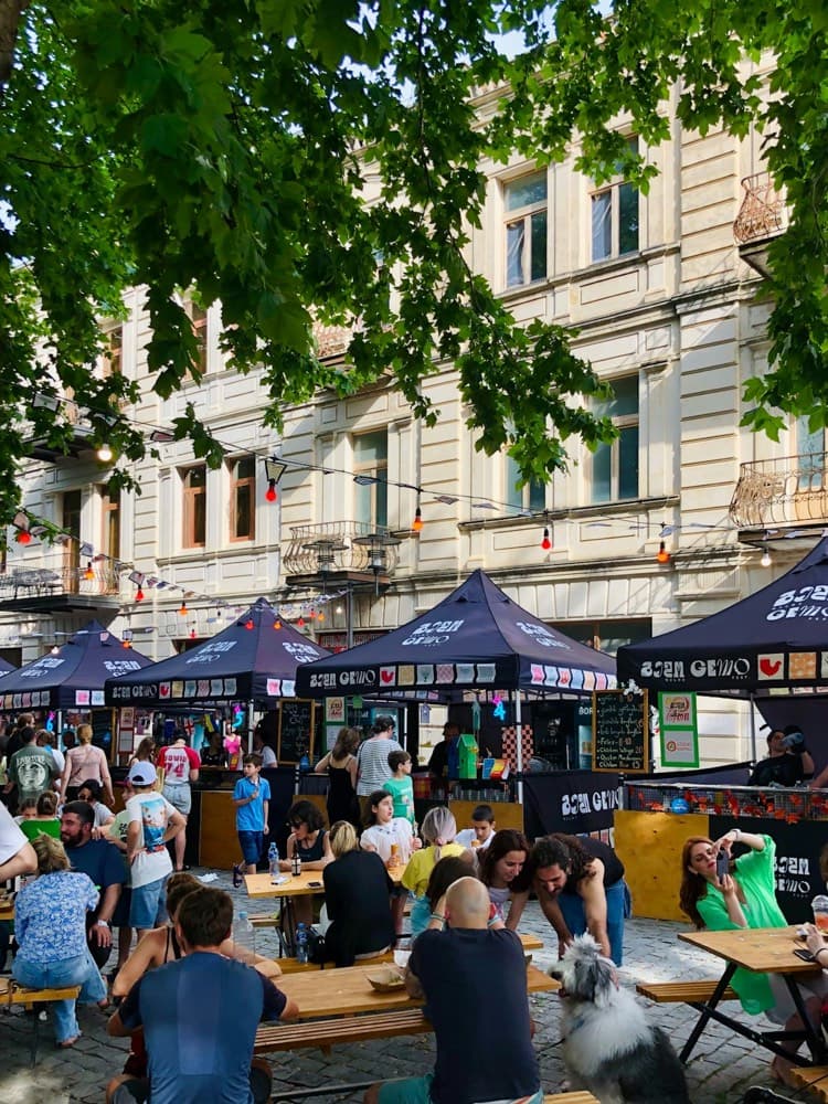 People eating at a food festival